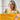 Woman holding a pill and glass of water with product features text overlay showing NAD+ Optimal - OptiNourish has high absporption